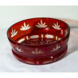 An etched ruby glass bowl