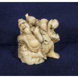 A carved ivory netsuke