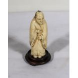 A small carved ivory figure