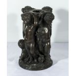 A fine quality bronze centre piece depicting putti