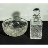 A cobble cut glass decanter together with a crystal bowl