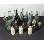 A collection of bottles including apothecary, medicine and stoneware