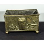 An Art Deco brass planter decorated with an owl