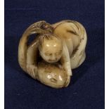 A netsuke, man with fish