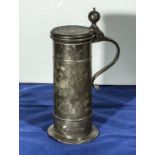 A pewter tankard dated 1770