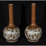 A pair of Japanese Kutani bottle vases