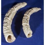 Two carved African ivory tusks