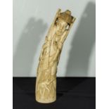 A carved ivory tusk