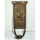 A copper wall sconce depicting the Coronation of Edward Vii