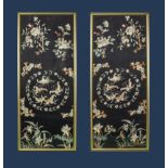 A pair of Chinese framed silk embroidered panels of butterflies and flowers