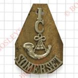 1/C/bugle/SOMERSET white metal cadet shoulder title.A scarce 2 part example on backing plate.