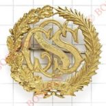 Sudan Civil Service pagri badge.Die-cast gilt wreath of oak and palm with “SCS” cypher to voided