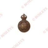 King Edward’s Horse OSD cap badge. A good scarce die-cast bronze example. Crowned circlet