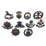 10 various OSD bronze cap badges King’s Liverpool (post 1926) ... WW1 Northumberland Fusiliers ...
