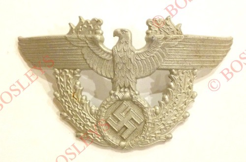 German Third Reich M1936 Police shako plate. A good die-stamped aluminium example by Assmann.