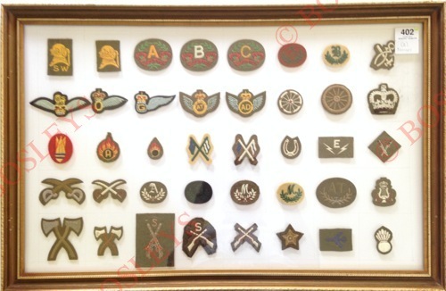 62 cloth trade and rank badges A good selection, mainly post 1953 examples. Framed and glazed in two