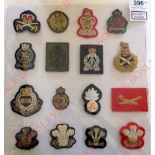 Selection of 34 post 1953 bullion and cloth cap badges, arm badges and collar badges. Caps include