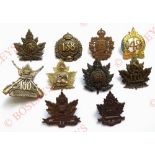 10 Canadian WW1 CEF cap badges. 136 ... 138 ... 140 ... 148 (verdigris) ... 150 ... 156 (AF) ... 166