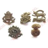 5 WW2 plastic economy Infantry cap badges. East Surrey ... Welch (Stanley, one blade absent) ...