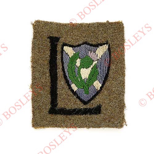 Badge. 52nd (Lowland) Division WW1 cloth formation sign. A good example. Khaki rectangle embroidered