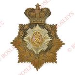 Badge. Scottish. Royal Scots Victorian OR’s helmet plate circa 1889-1901. A good die-stamped brass