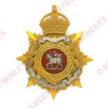 Badge. Queen’s Royal West Surreys Officer’s helmet plate circa 1911-14. A fine scarce gilt example