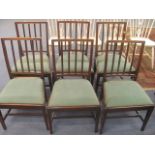 A set of six early 19th century George 111 mahogany spindle back dining chairs with drop-in seats