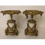 A pair of 19th century white marble and gilt brass garniture having ornate cast decoration