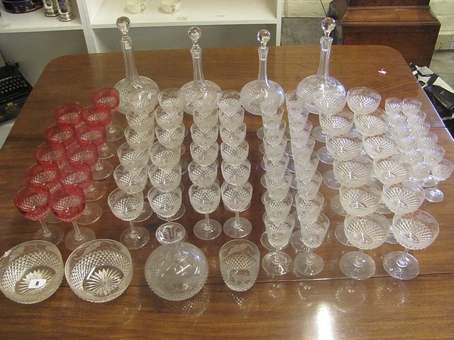 A suite of Victorian table glass having a continuous wheel engraved band of floral design, above