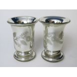 A pair of Hale Thornson's patent mercury silvered glass vases of cylinder section with everted glass
