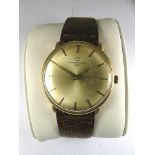 A 9ct gold cased Eterna Matic 3000 gents wrist watch, the silvered dial with gold batons and