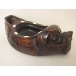 Early to mid 20th century North American Indian carved wooden grease bowl, Haida peoples, in the