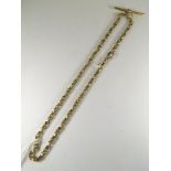 A late 19th century 15ct yellow gold fancy link Albert chain with 9ct gold T bar