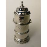 A 20th century silver sugar caster in the form of a light house, Sheffield 1930, 6" high