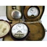 A silver calendar Hebdomas pocket watch together with another in a gunmetal case and a miniature