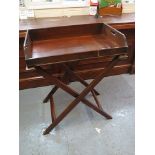 A 19th century mahogany butler's tray and stand