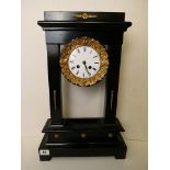 Laine a Paris a 19th century ebonized wooden cased mantle clock, the white enamelled dial with