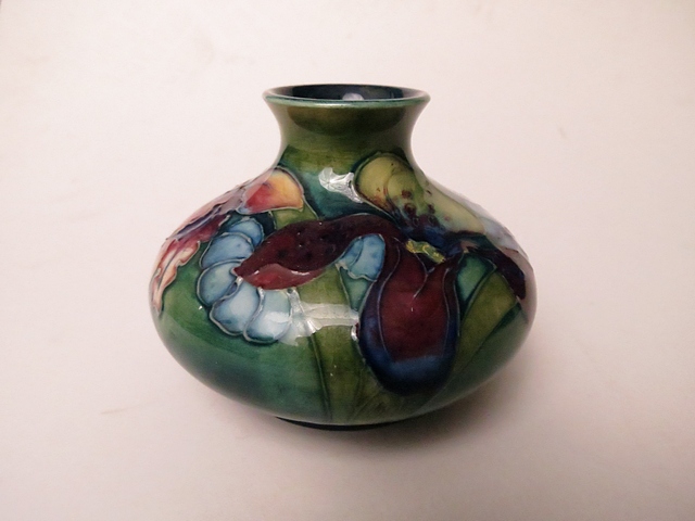 Walter Moorcroft - Orchid pattern vase, of squat form with waisted narrow neck, 2 7/8" high