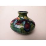 Walter Moorcroft - Orchid pattern vase, of squat form with waisted narrow neck, 2 7/8" high