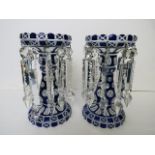 A pair of 19th century French blue overlaid opal and crystal cut glass table lustres
