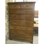 A George 111 mahogany chest on chest having two short and six long drawers, brass handles on bracket