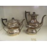 A 20th century silver four piece teaset having moulded rims with ebony handles