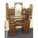 An ornate Victorian walnut dressing table