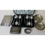 A small selection of mixed silver and white metal items to include a small cigarette case