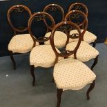 J & E Skegg, a set of six Victorian mahogany balloon back chairs with overstuffed seats on French