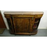 A 19th century gilt metal mounted credenza having a single panelled central cupboard flanked by