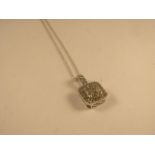 An art deco style brilliant cut diamond set plaque pendant on a chain