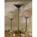 An Edwardian brass desk lamp with two art deco chrome lamps