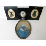 A pair of cut paper and bronzed silhouettes signed Speight, an ebonized framed miniature of a