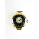 An early 20th century half hunter ladies wrist watch with blue enamel chapter ring, movement